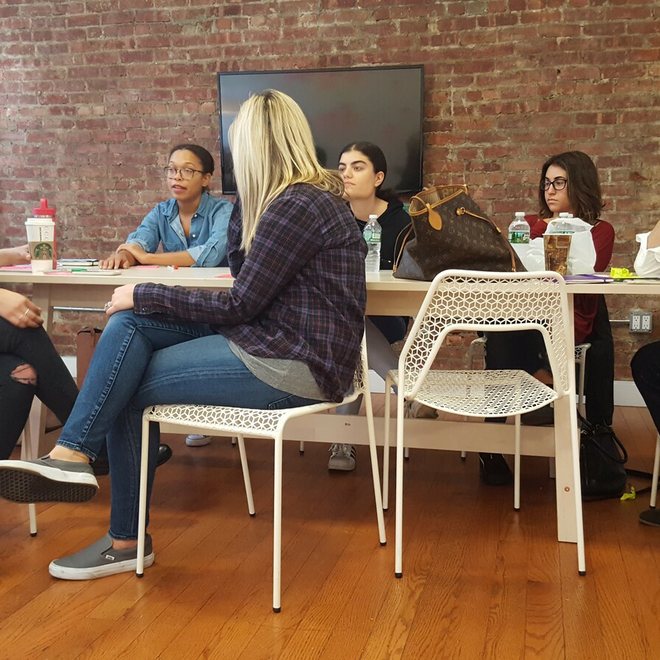 A team in conversation around a table