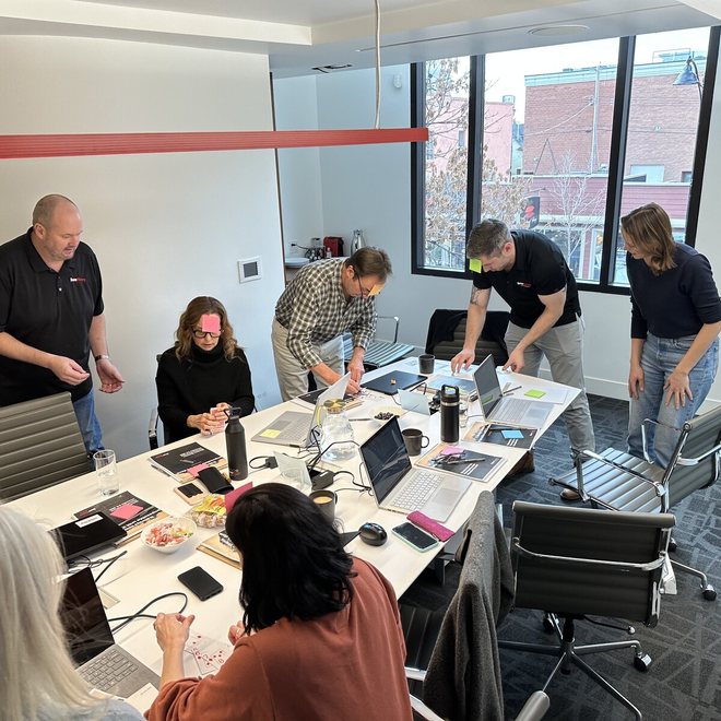 Leaders working at a conference table